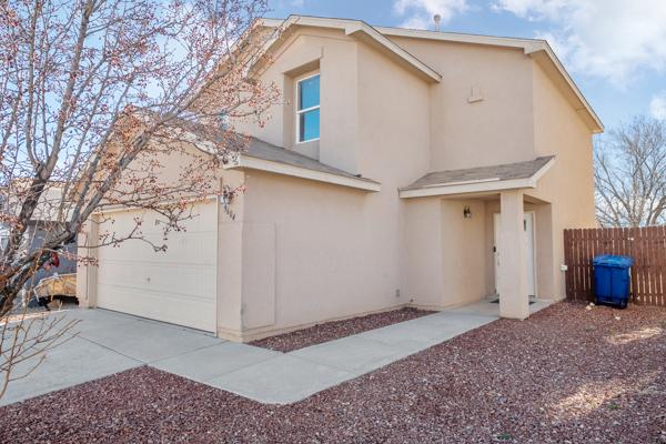 Completed two-story stucco home renovation in Albuquerque